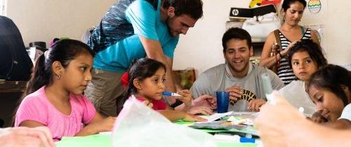 Student working with school children in Merida, Mexico